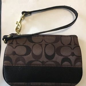 Dark brown Coach wristlet